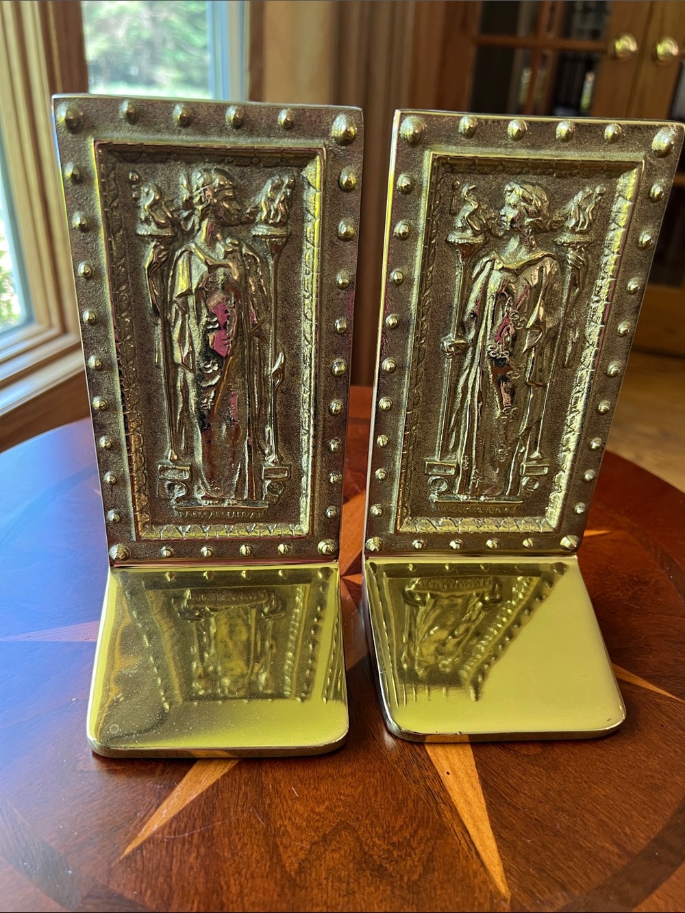 Ornate Gold Metal Bookends with Classical Relief - Gold